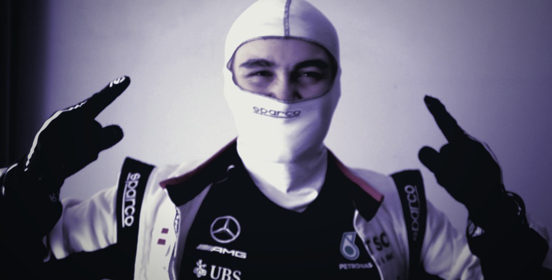 Alp Akkalyoncu in racing suit and balaclava